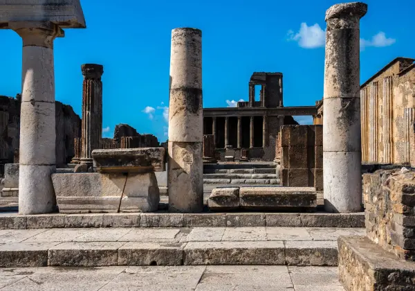 Ancient ruins of Pompeii with Mount Vesuvius in the background